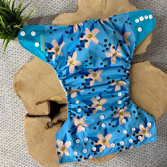 Couche lavable fleur bleue
